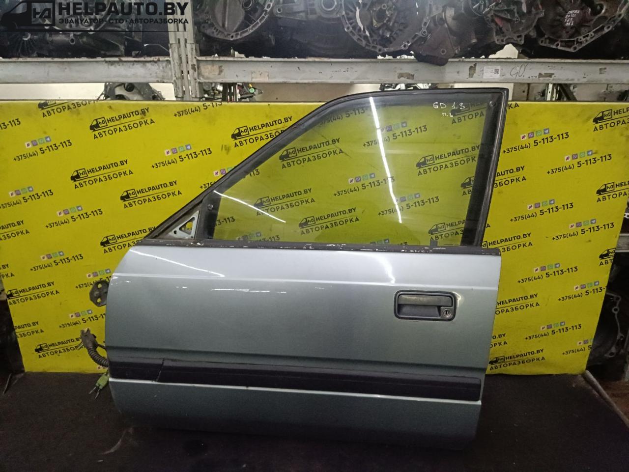 дверь передняя левая Mazda 626 3 поколение 1990, 2.0 л., F8 (12V), бензин, 5МКПП, серебристый, седан, передний привод - фото №1