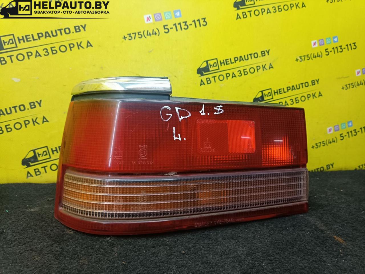 фонарь задний левый Mazda 626 3 поколение 1990, 2.0 л., F8 (12V), бензин, 5МКПП, серебристый, седан, передний привод - фото №1