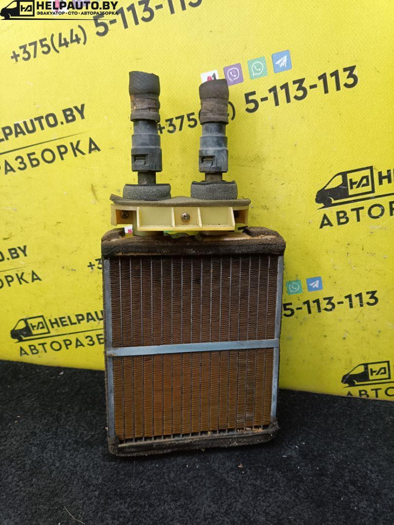 радиатор отопителя (печки) Mazda Xedos 6 1 поколение 1995, 2.0 л., бензин, МКПП, серый, седан, передний привод - фото №1