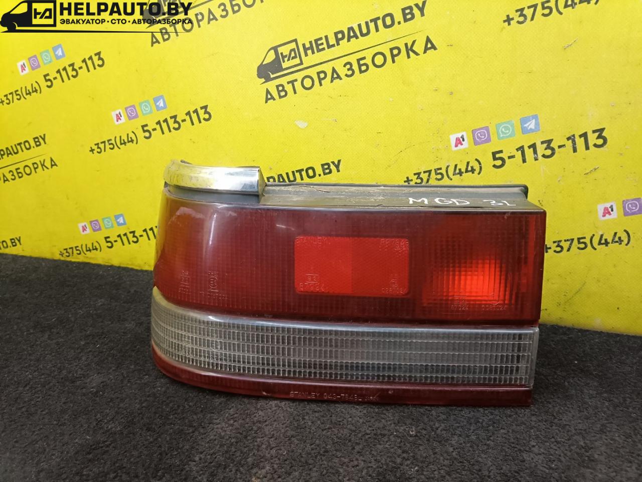 фонарь задний левый Mazda 626 3 поколение 1990, 1.8 л., бензин, МКПП, серый, седан, передний привод - фото №1