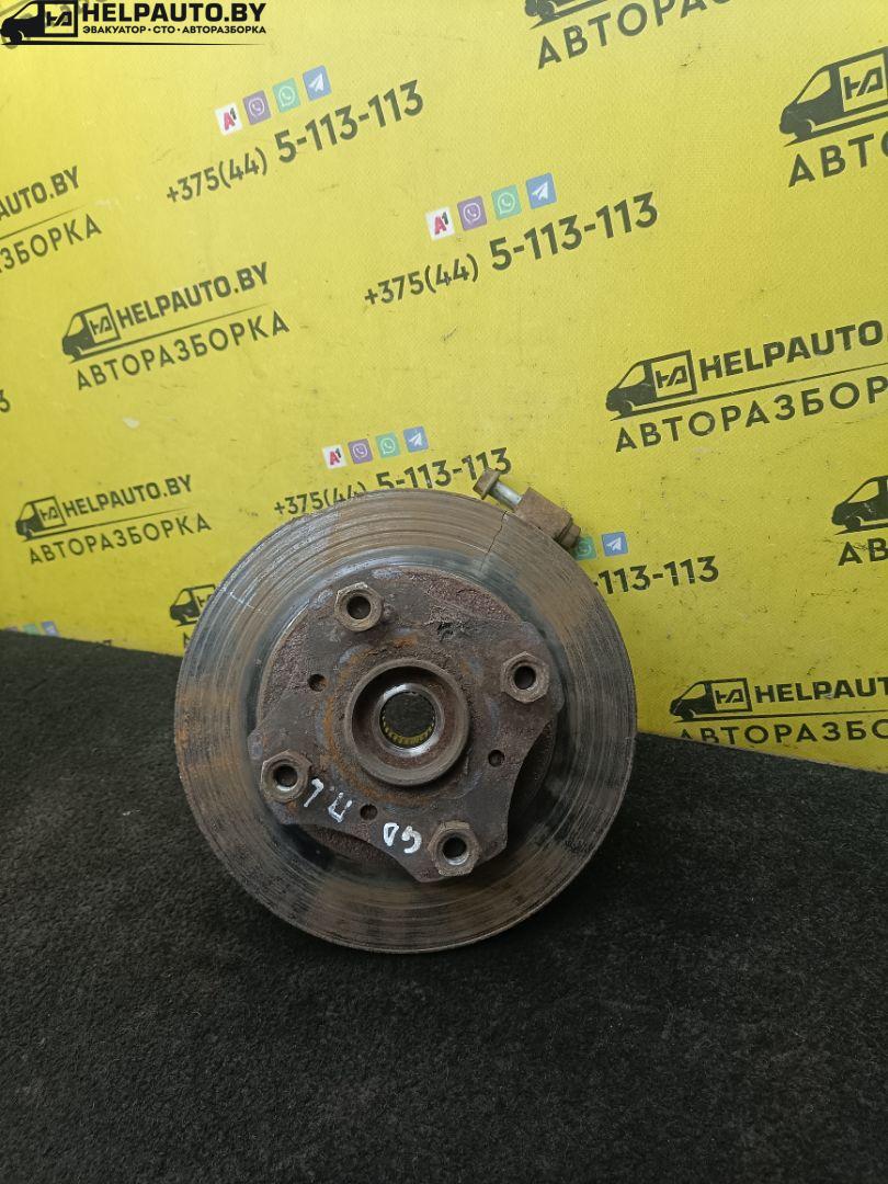 ступица передняя левая Mazda 626 3 поколение 1990, 1.8 л., бензин, МКПП, серый, седан, передний привод - фото №1