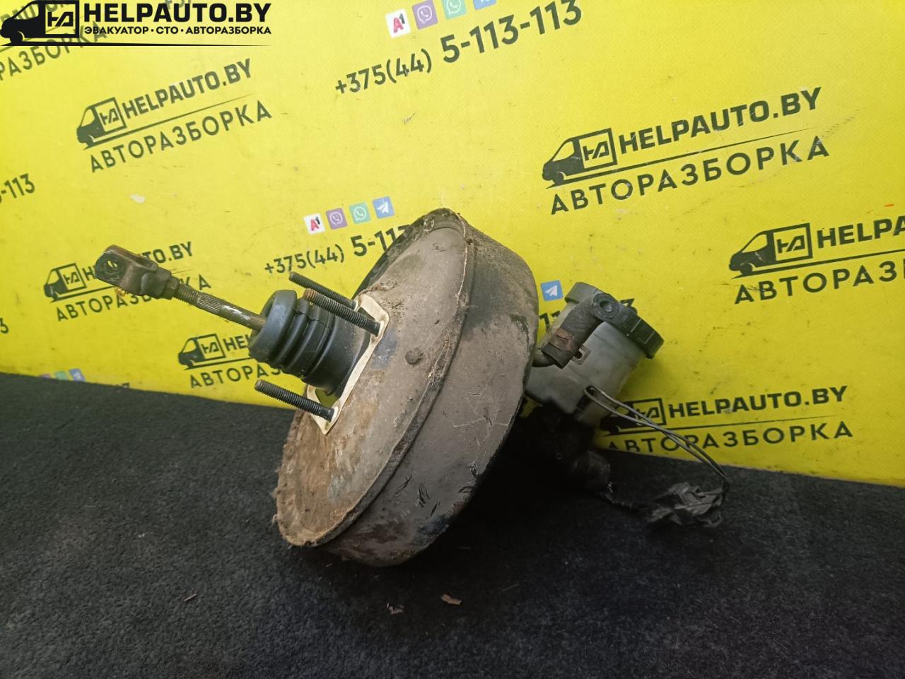 цилиндр тормозной главный Mazda 626 3 поколение 1990, 1.8 л., бензин, МКПП, серый, седан, передний привод - фото №1