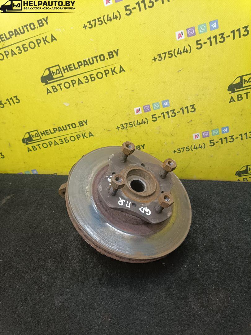 ступица передняя правая Mazda 626 3 поколение 1990, 1.8 л., бензин, МКПП, серый, седан, передний привод - фото №1