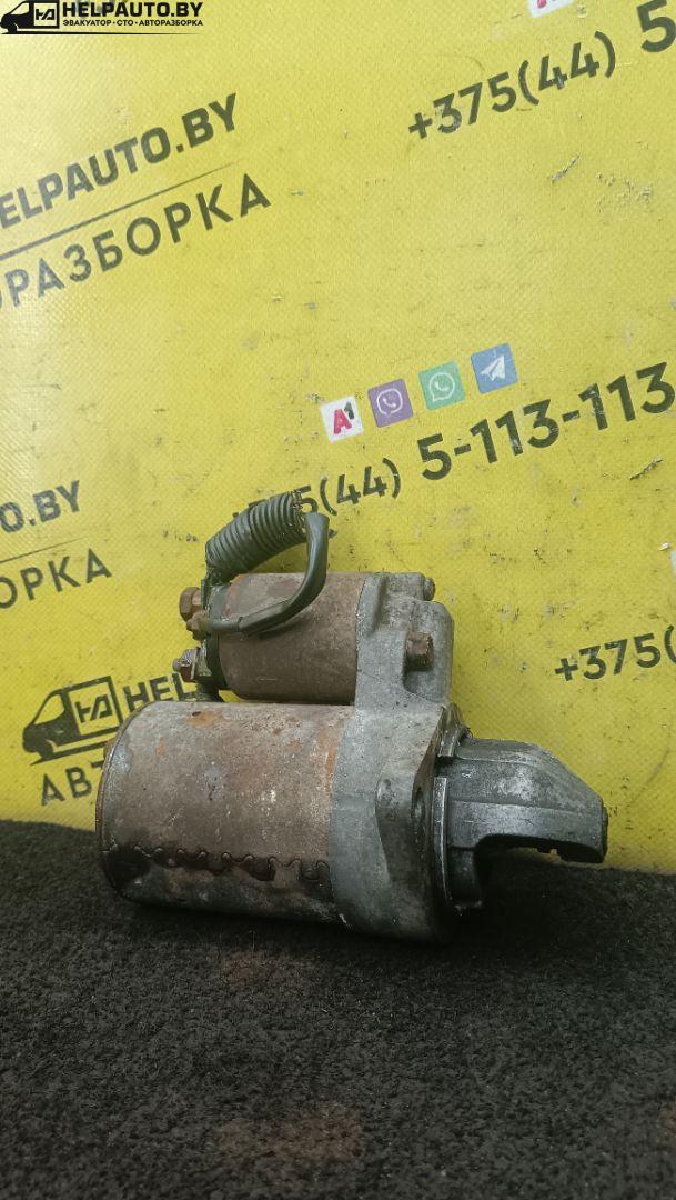 стартер Daewoo Nexia 1 поколение 2000, 1.5 л., G15MF, бензин, МКПП, красныц, хетчбэк 5 дв., передний привод - фото №1