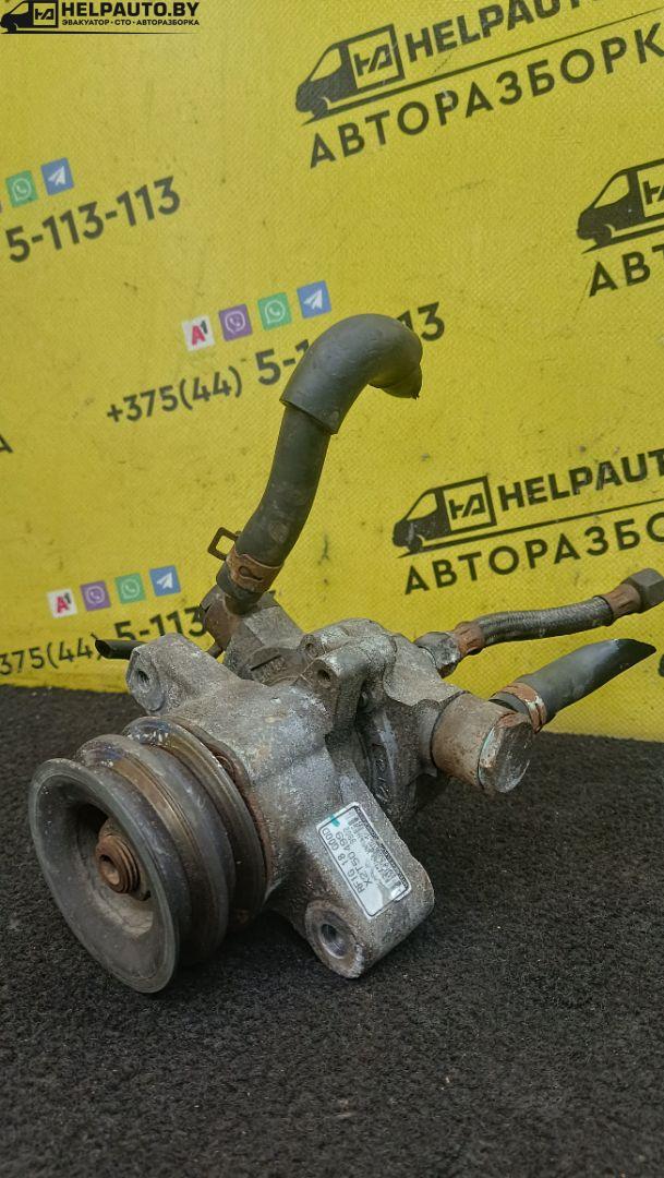 насос вакуумный Mazda 323 6 поколение 1998, 2.0 л., дизель, МКПП, синий, хетчбэк 3 дв., RF1G18G00D, X2T50499 - фото №1