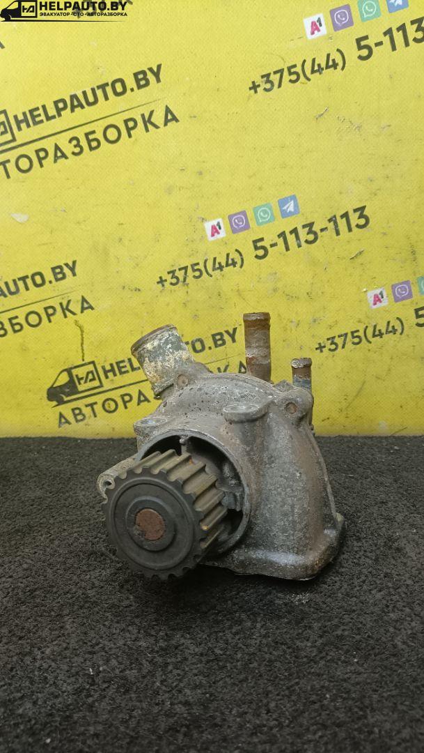 помпа Mazda 323 6 поколение 1998, 2.0 л., дизель, МКПП, синий, хетчбэк 3 дв. - фото №1