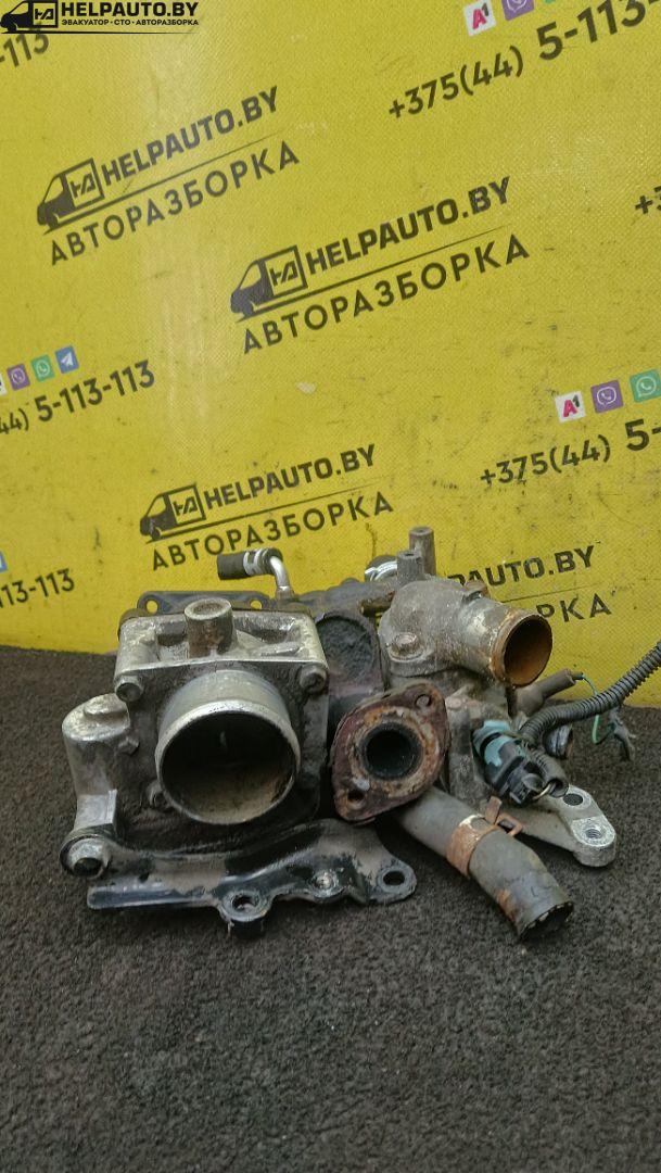 заслонка дроссельная Opel Astra H 2005, 1.7 л., дизель, МКПП, синий, хетчбэк 5 дв., передний привод - фото №1