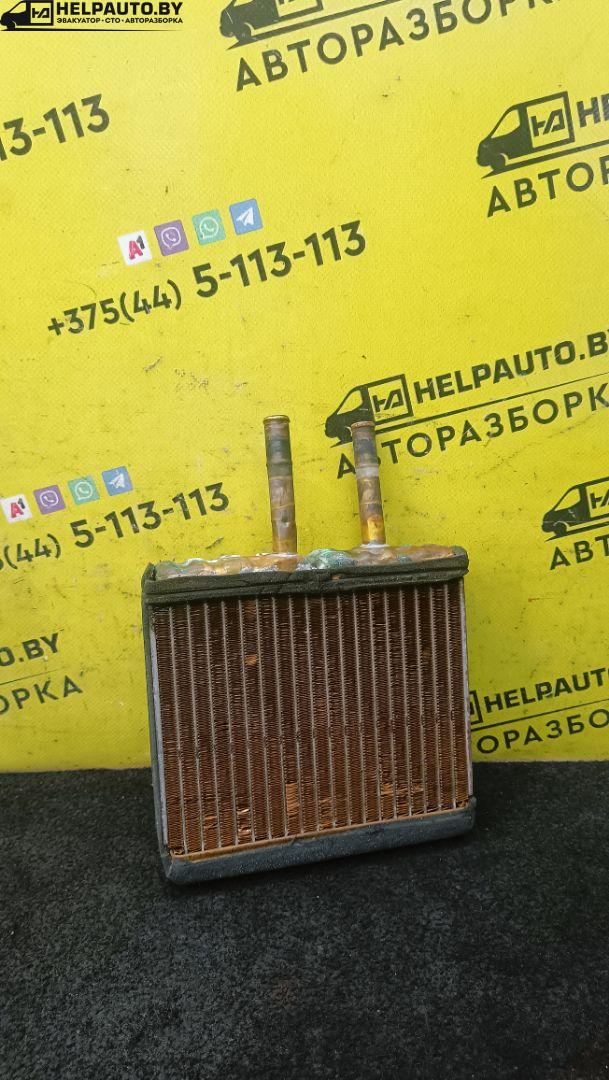 радиатор отопителя (печки) Suzuki Baleno 1 поколение (1995 - 2002), 1.6 л., G16B, бензин, МКПП, серебристый, универсал, передний привод - фото №1