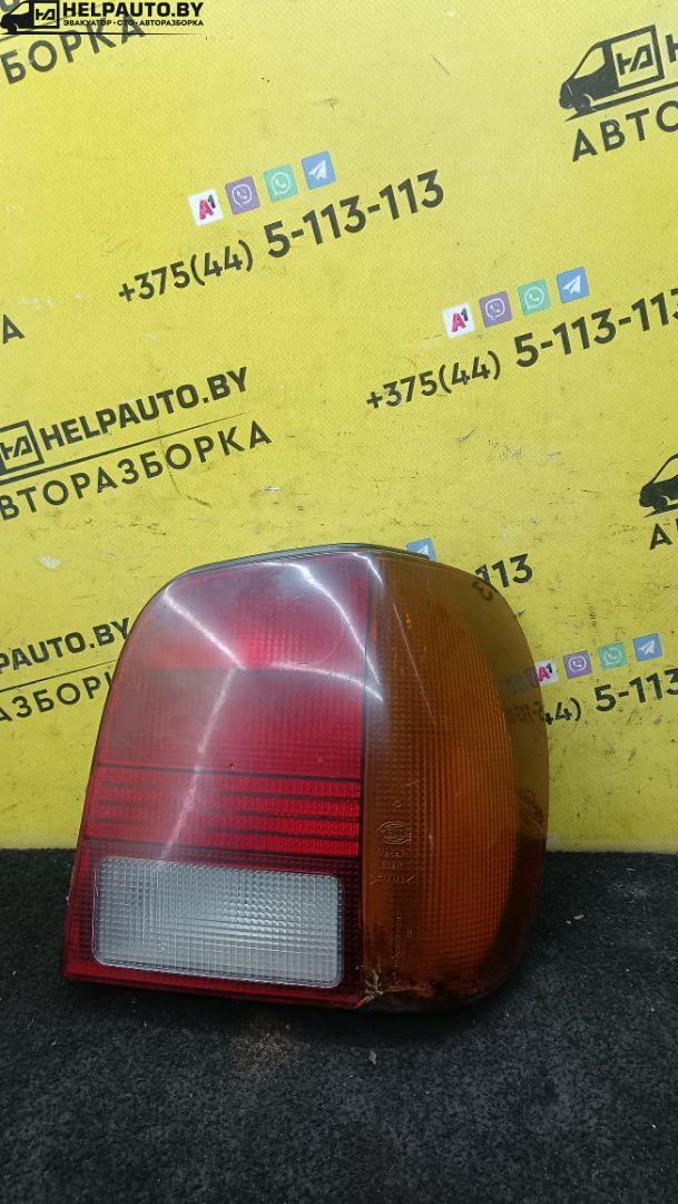 фонарь задний правый Volkswagen Polo 3 поколение 1999, 1.4 л., бензин, МКПП, черный, хетчбэк 3 дв., передний привод - фото №1