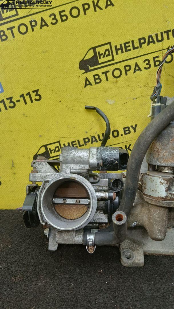 заслонка дроссельная Opel Vectra B 1997, 1.6 л., X 16 XEL, бензин, МКПП, красный, седан, передний привод - фото №1