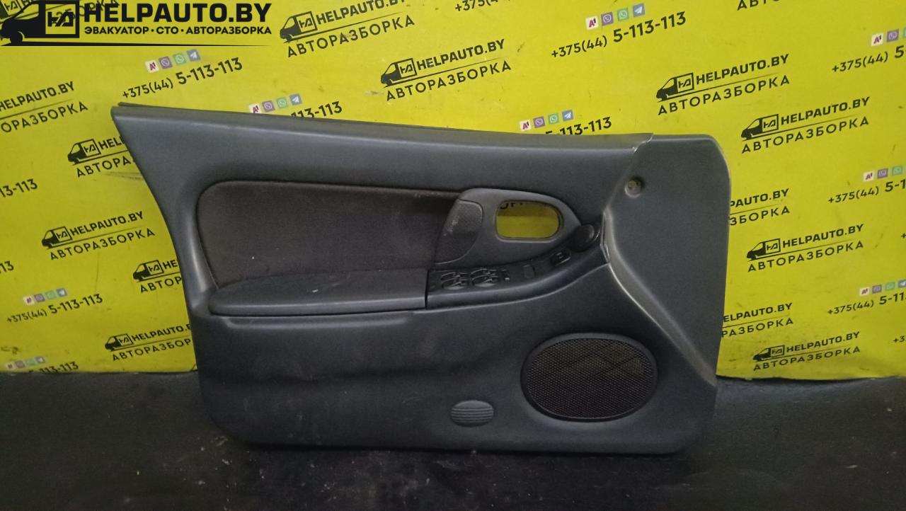 обшивка двери передняя левая Mazda 323 5 поколение 1994, 1.8 л., BP (DOHC), бензин, МКПП, красный, хетчбэк 5 дв., передний привод - фото №1