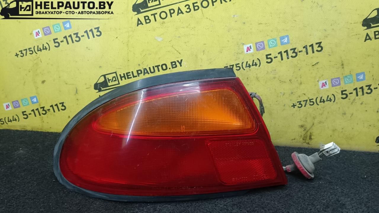 фонарь задний левый Mazda 323 5 поколение 1994, 1.8 л., BP (DOHC), бензин, МКПП, красный, хетчбэк 5 дв., передний привод - фото №1