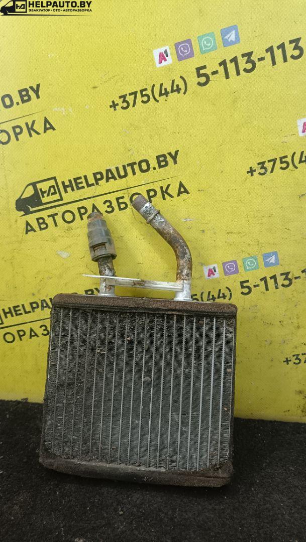 радиатор отопителя (печки) Mazda 323 5 поколение 1994, 1.8 л., BP (DOHC), бензин, МКПП, красный, хетчбэк 5 дв., передний привод - фото №1