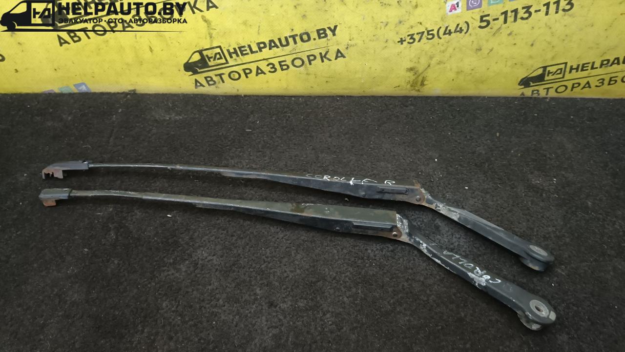 щеткодержатель (поводок стеклоочистителя, дворник) Toyota Corolla 5 поколение (E80) 1984, 1.3 л., бензин, МКПП, красный, хетчбэк 5 дв., передний привод - фото №1