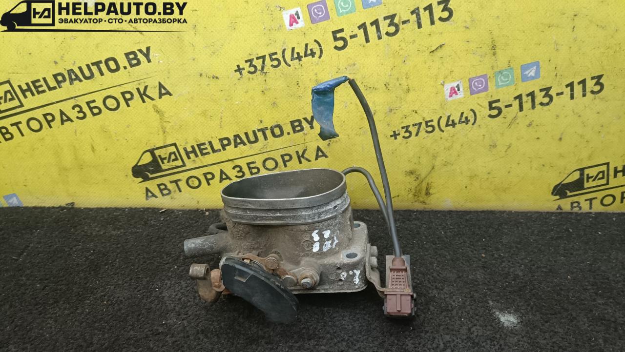 заслонка дроссельная Audi 100 С3 1988, 2.0 л., бензин, МКПП, седан, передний привод - фото №1