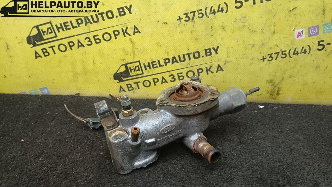 корпус термостата Ford Mondeo 1 поколение 1996, 1.8 л., дизель, МКПП, синий, универсал, передний привод - фото №1