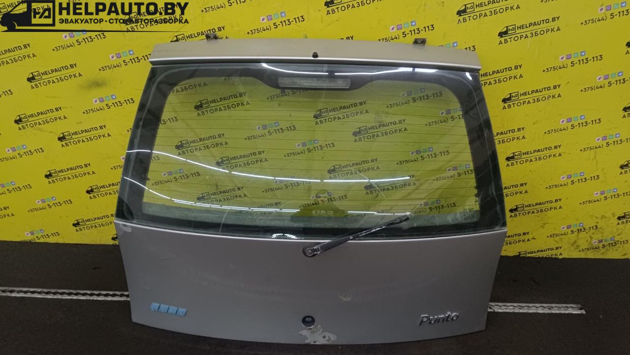 обшивка крышки багажника Fiat Punto 2 поколение 2002, 1.2 л., 188 A4.000, бензин, 5МКПП, серый, хетчбэк 3 дв., передний привод - фото №1