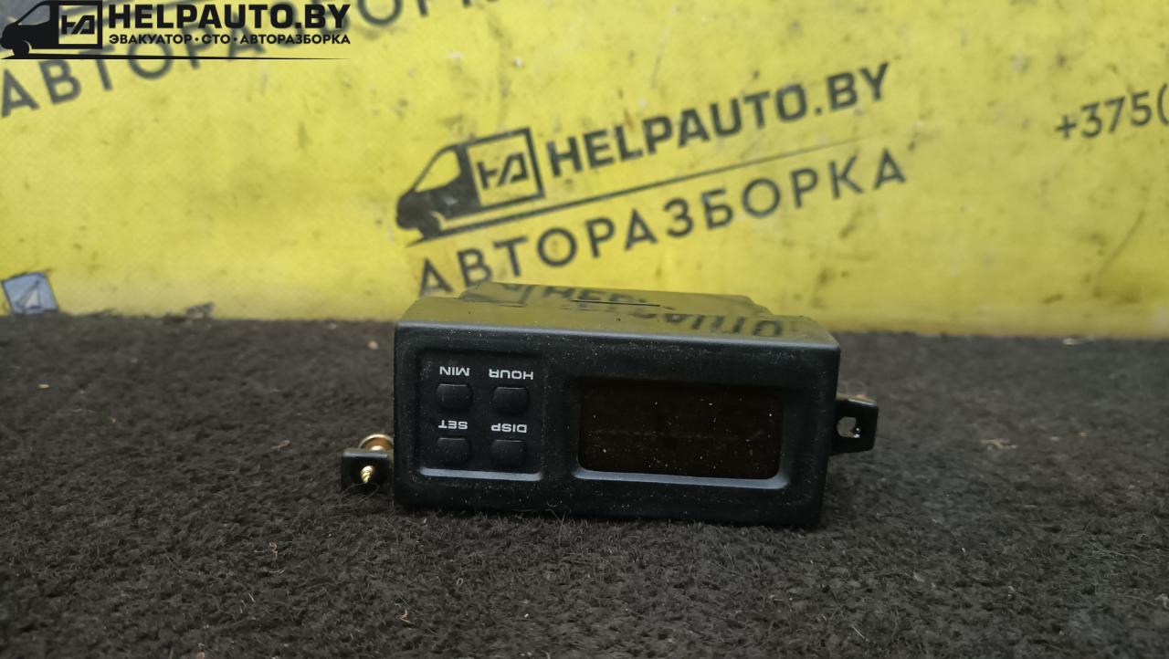 часы Kia Sephia 1 поколение 1993, 1.5 л., бензин, МКПП, белый, седан - фото №1
