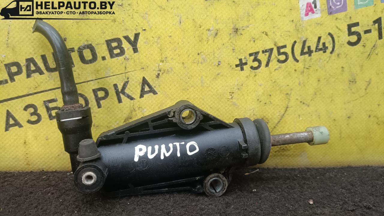 цилиндр сцепления рабочий Fiat Punto 1 поколение 1997, 1.2 л., бензин, МКПП, красный, хетчбэк 3 дв., передний привод - фото №1