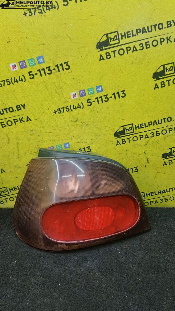 фонарь задний левый Renault Megane 1 поколение 1996, 1.6 л., бензин, МКПП, черный, хетчбэк 5 дв., передний привод - фото №1