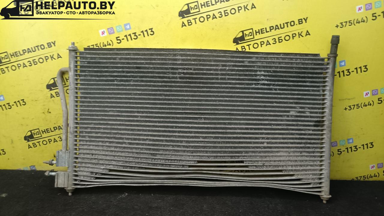 радиатор кондиционера Ford Focus 1 поколение 2001, 1.8 л., дизель, МКПП, синий, универсал, передний привод - фото №1