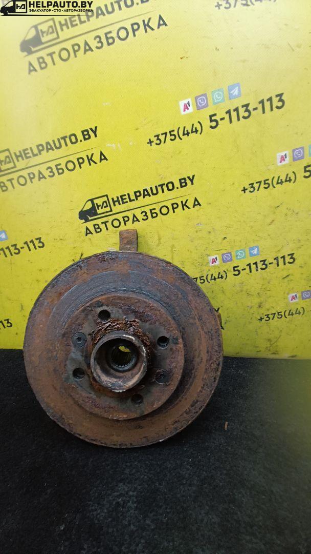 ступица передняя левая Renault Clio 2 поколение 2000, 1.4 л., бензин, МКПП, серебро, хетчбэк 3 дв., передний привод - фото №1