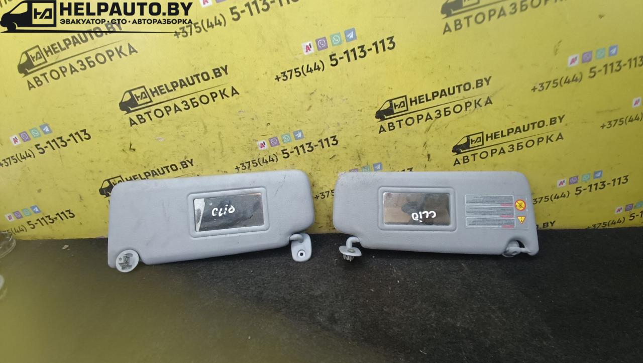 козырек солнцезащитный Renault Clio 2 поколение 2000, 1.4 л., бензин, МКПП, серебро, хетчбэк 3 дв., передний привод - фото №1