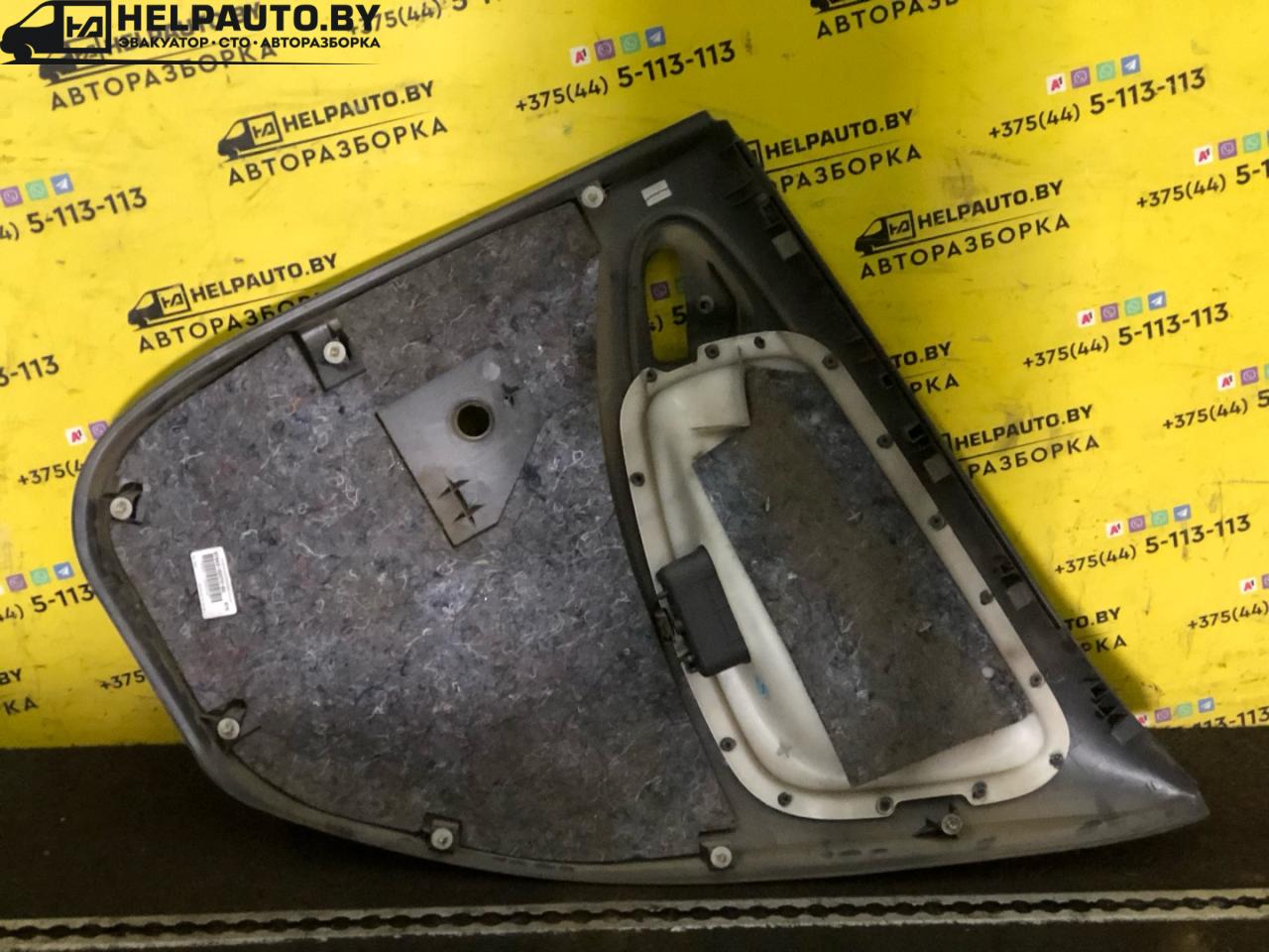 обшивка двери задняя левая Toyota Yaris P1 2001, 1.0 л., 1SZ-FE, бензин, МКПП, серебро, хетчбэк 5 дв., передний привод - фото №1