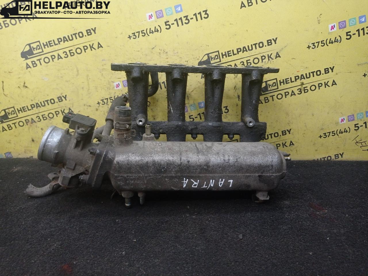 коллектор впускной Hyundai Lantra J2 1997, 1.5 л., G4EK, бензин, МКПП, бордовый, универсал, передний привод - фото №1