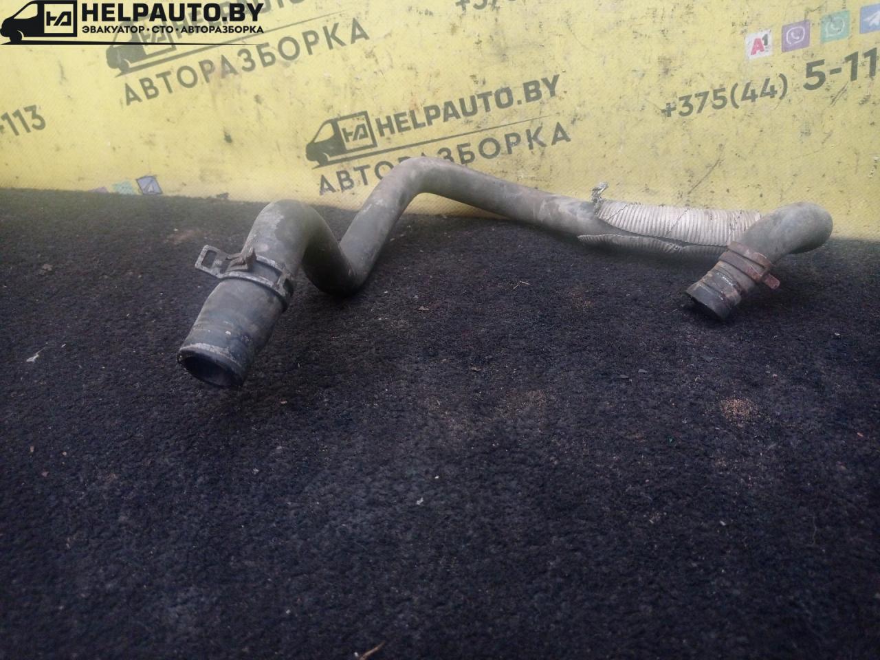 патрубок радиатора Ford Focus 1 поколение 2001, 1.8 л., дизель, МКПП, синий, универсал, передний привод - фото №1
