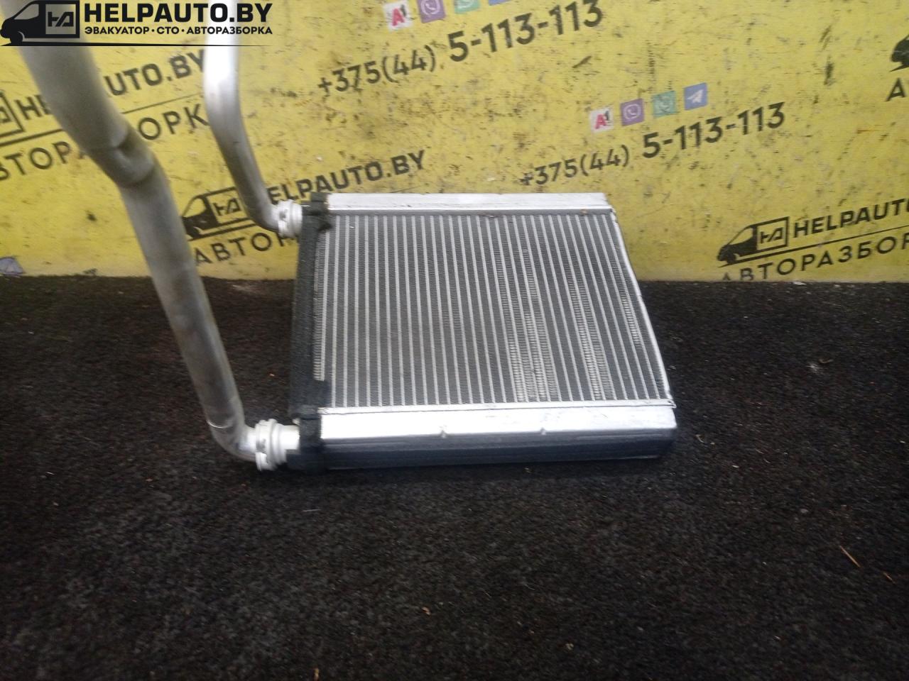 радиатор отопителя (печки) Honda Jazz 1 поколение 2002, 1.3 л., L13B, бензин, МКПП, голубой, хетчбэк 5 дв., передний привод - фото №1