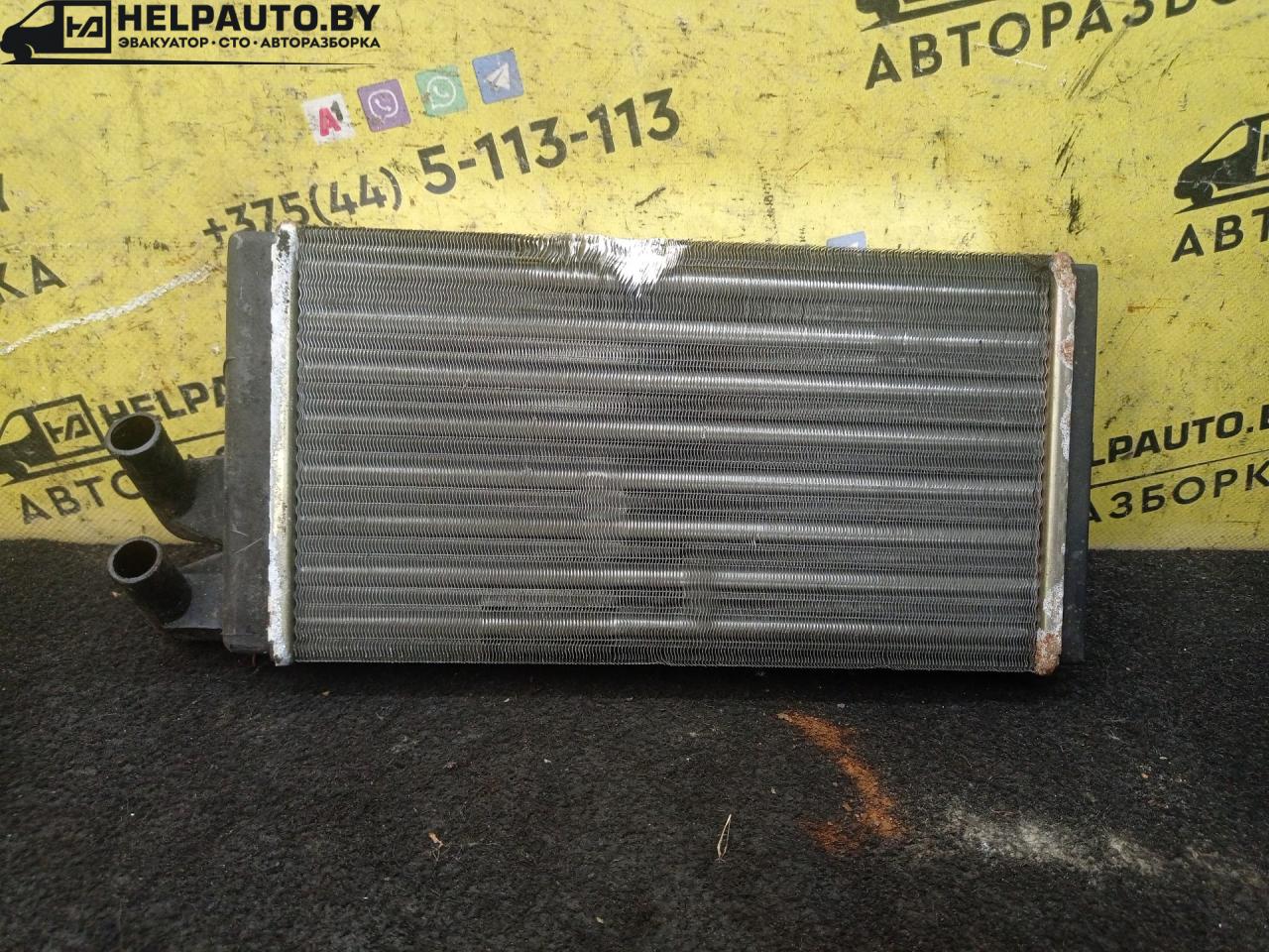 радиатор отопителя (печки) Audi 100 С3 1985, 1.8 л., бензин, 5МКПП, серый, седан, передний привод - фото №1