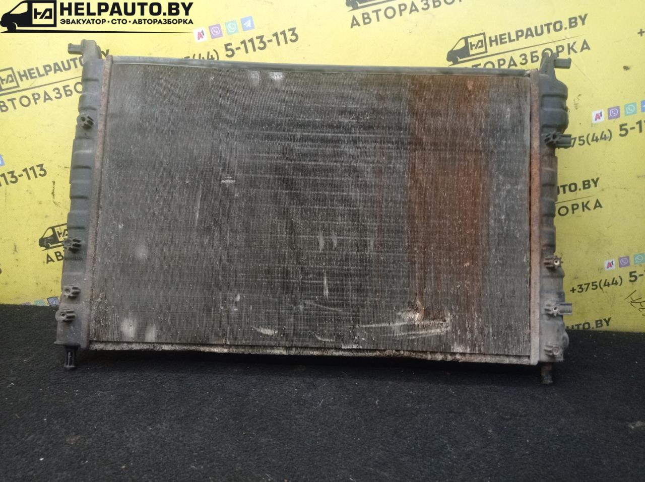 радиатор (основной) Fiat Palio 1 поколение 1998, 1.2 л., бензин, МКПП, черный, универсал, передний привод - фото №1