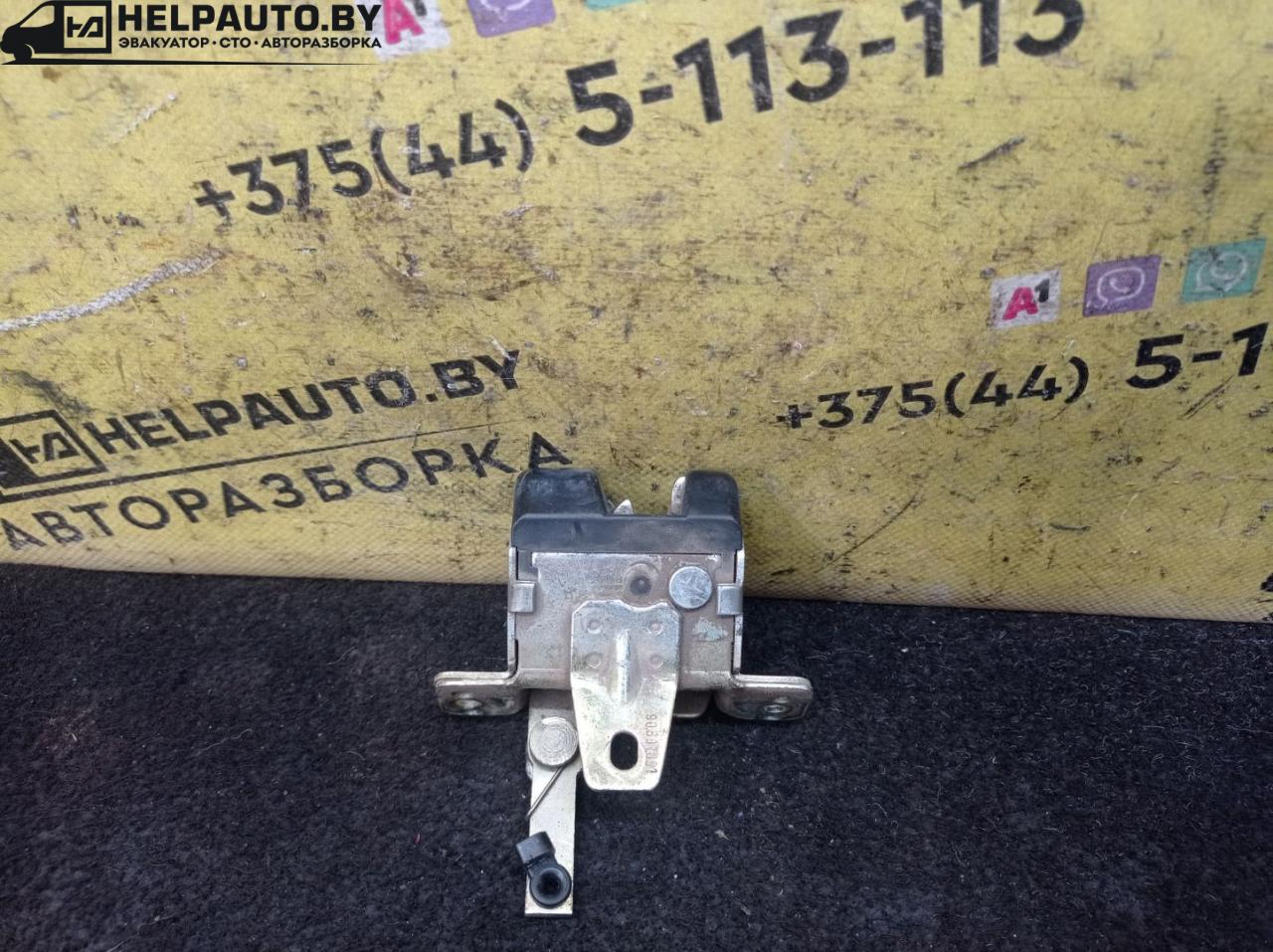 замок багажника Opel Astra F 1992, 1.4 л., C 14 NZ, бензин, МКПП, красный, хетчбэк 5 дв., передний привод - фото №1